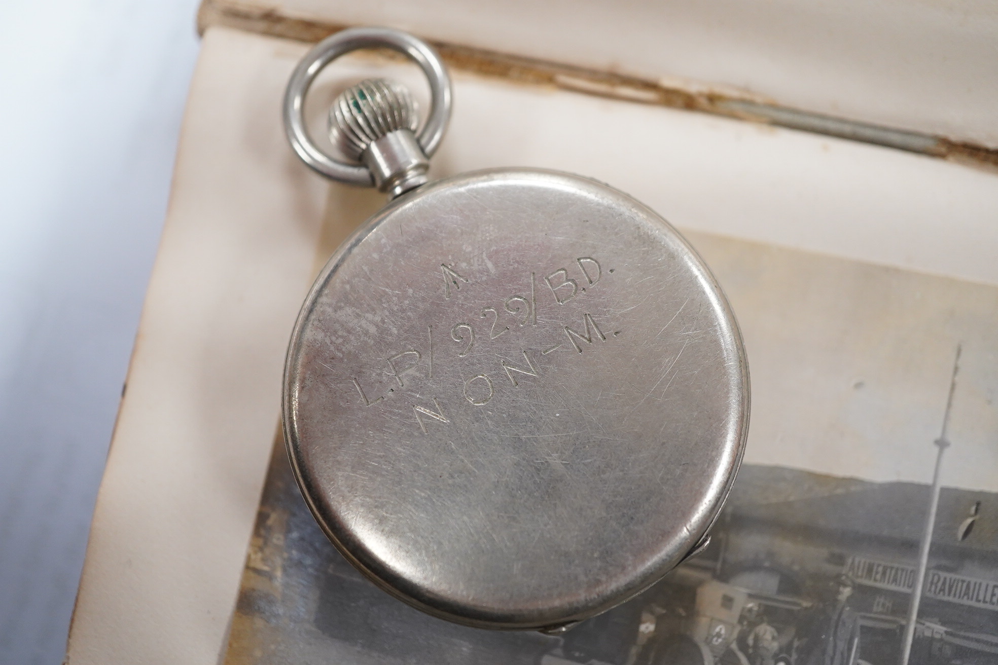 A WWI Ambulance and Balloon Brigade photograph album, pocket watch, coin, etc. Condition - fair, pocket watch ticks when wound